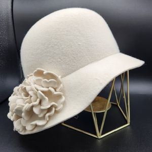 Holt Renfrew Woman's Wool hat 21 inch crown measurements.